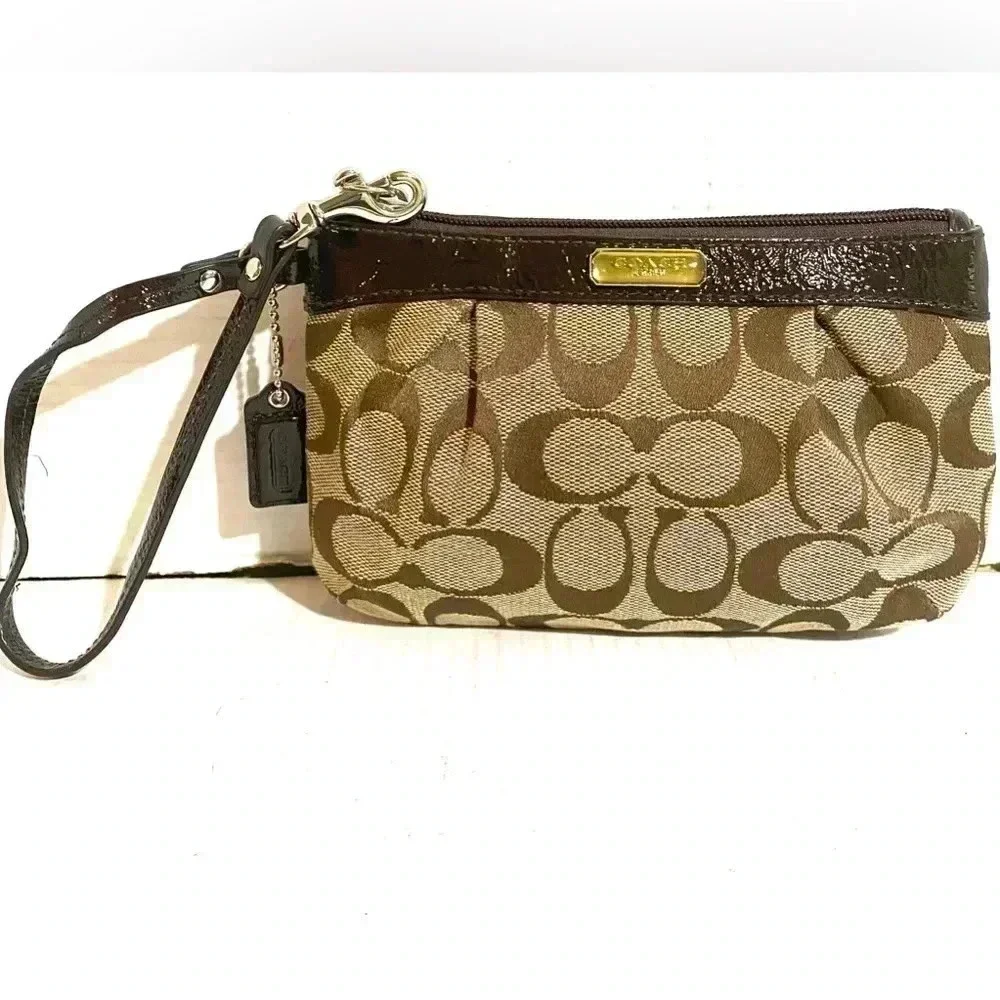 Coach CC signature print canvas wristlet